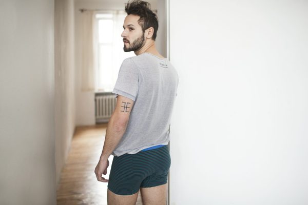 Gray striped boxer shorts men photography session