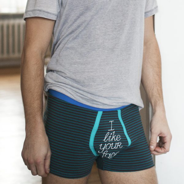 Colorful striped boxer shorts men photography session