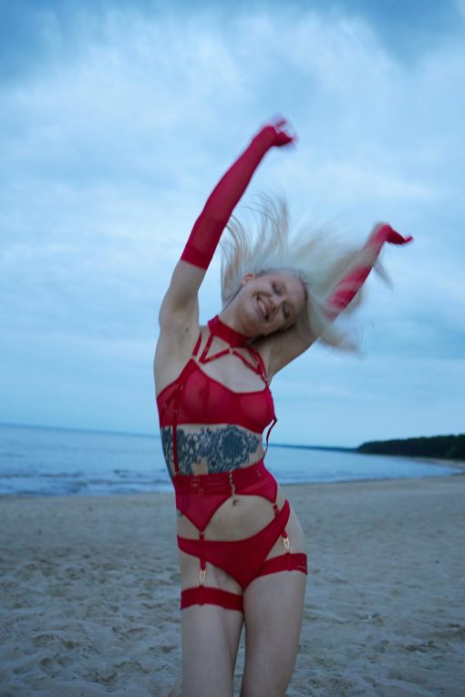 Sabine red lingerie set on beach